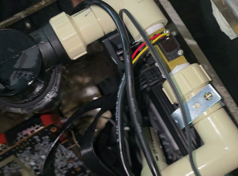 CoreVault immersion cooling loop with pump, flow sensor and plumbing
